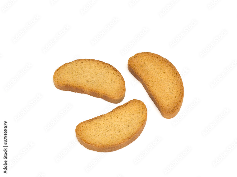 Three crispy rusks on a white background Three crispy rusks on a white background