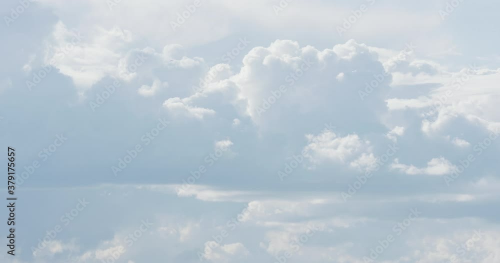 Timelapse sky background with white clouds on a foggy skyscape Timelapse sky background with white clouds on a foggy skyscape