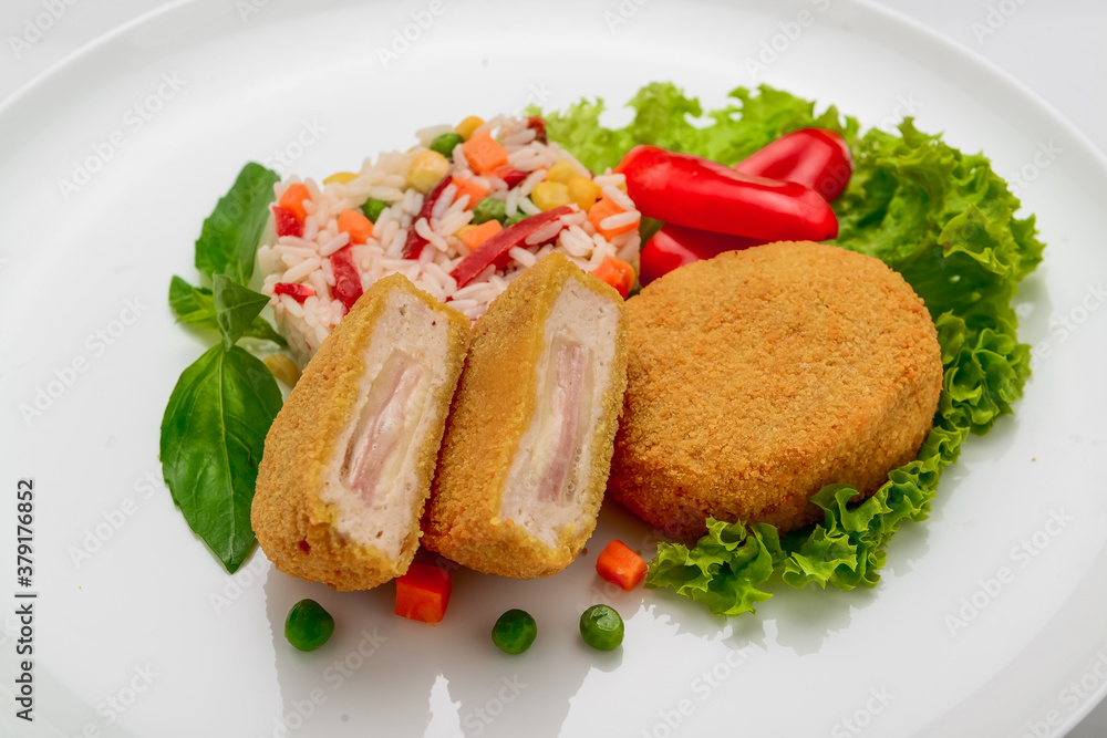 Chicken meatballs in batter with ham and risotto Chicken meatballs in batter with ham and risotto