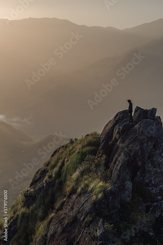 silhouette of a man on a mountain © Johnny