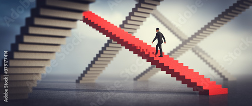 Foto Businessman going upstairs on his selected way.