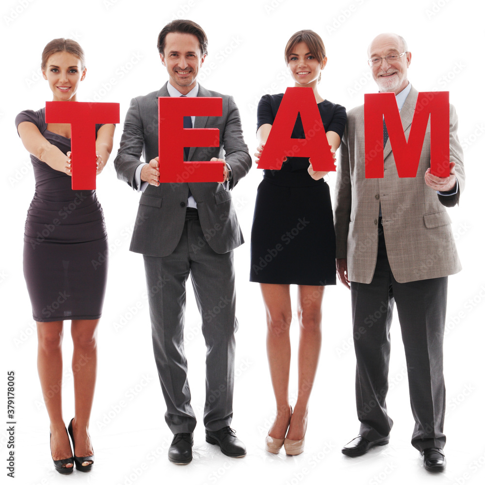 Business team holding the letters