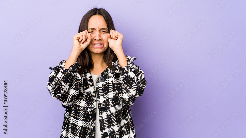 Young mixed race hispanic woman isolated whining and crying disconsolately. Young mixed race hispanic woman isolated whining and crying disconsolately.