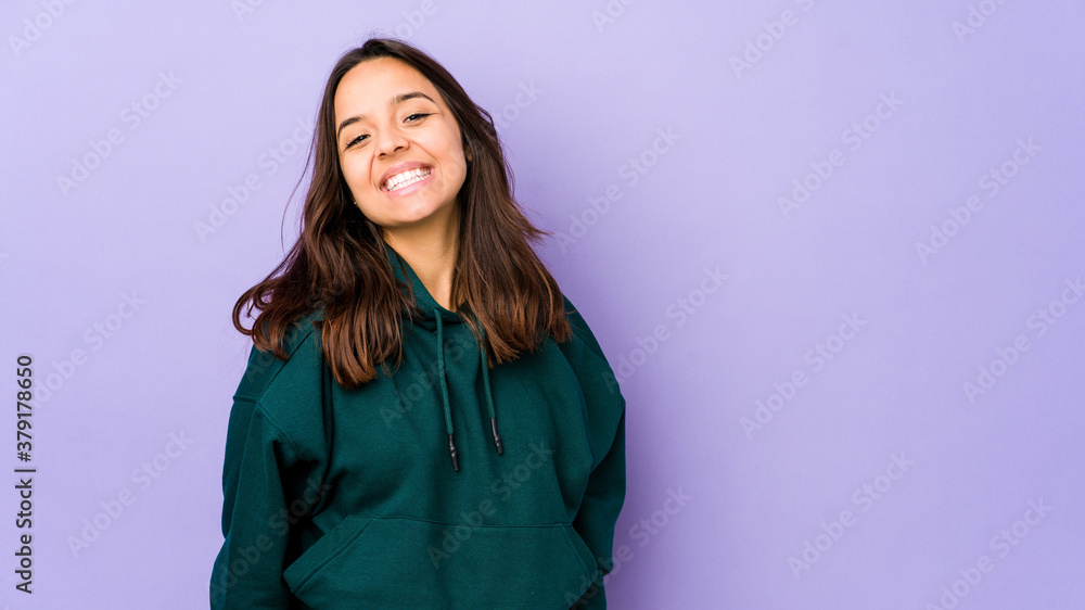 Young mixed race hispanic woman isolated happy, smiling and cheerful. Young mixed race hispanic woman isolated happy, smiling and cheerful.