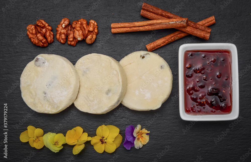 Fototapeta premium Cottage cheese pancakes and strawberry sauce. Frozen food
