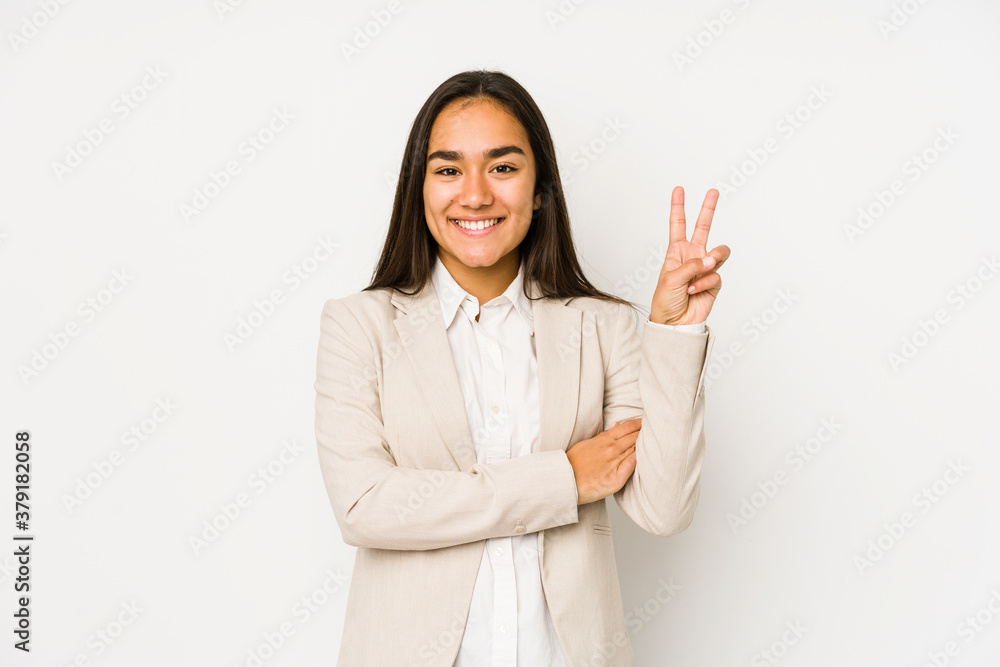 Young woman isolated on a white background showing number two with fingers. Young woman isolated on a white background showing number two with fingers.