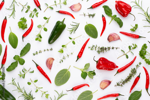 Wallpaper Mural Spice herbal leaves and chili pepper on white background. Vegetables pattern. Floral and vegetables on white background. Top view, flat lay. Torontodigital.ca