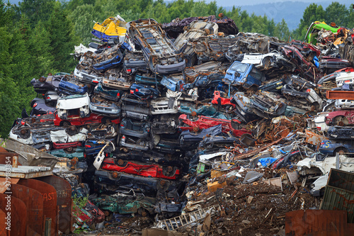 old car dump (big pile of cars)