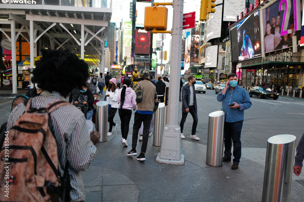 Sept 19, 2020 People start going back to Times Square after the re-opening from the Lockdown from Covid-19 with masks, New York City, USA.