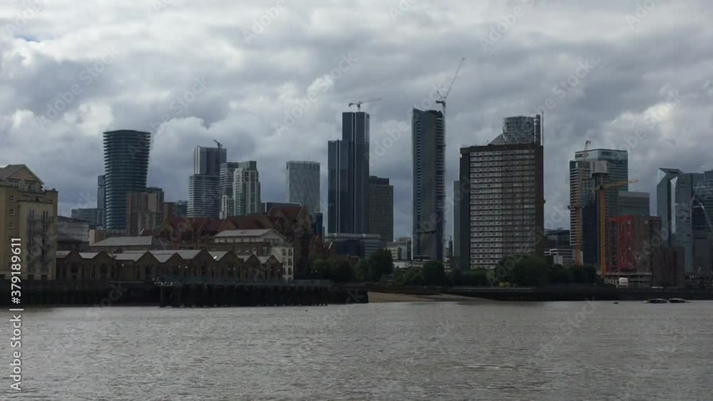 Canary Wharf, London, UK, business district of London viewed from river - stock footage Canary Wharf, London, UK, business district of London viewed from river - stock footage