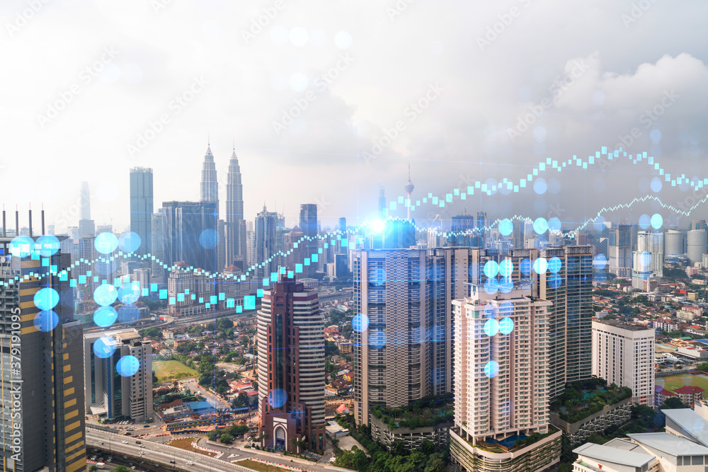 Obraz premium Forex and stock market chart hologram over panorama city view of Kuala Lumpur. KL is the financial center in Malaysia, Asia. The concept of international trading. Double exposure.