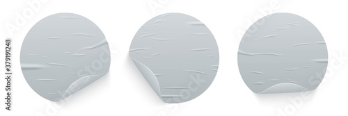 Glued round stickers with curled edges set isolated on white background. Vector realistic crumpled posters bundle. Wet greased wrinkles templates. Empty advertising circles mockup for creative design.