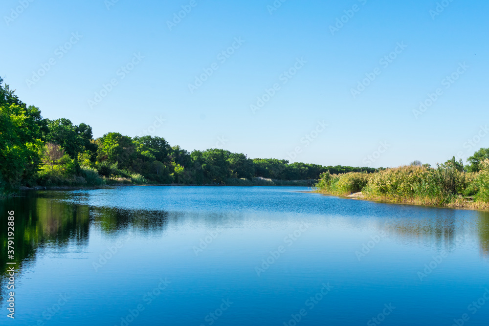 Idyllic landscape with a clear lake. Severodonetsk. Lake Kleshnya. Idyllic landscape with a clear lake. Severodonetsk. Lake Kleshnya.