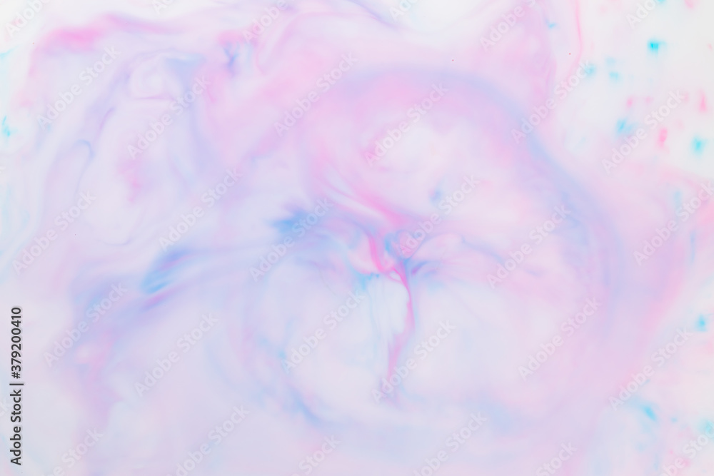 Fluid art texture. Pink blue background from liquid. Photography of colored spots on liquid. Abstract pattern Fluid art texture. Pink blue background from liquid. Photography of colored spots on liquid. Abstract pattern