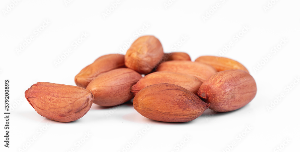 dried peanuts on white background, macro dried peanuts on white background, macro