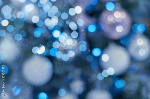 blurred christmas tree background in winter colors