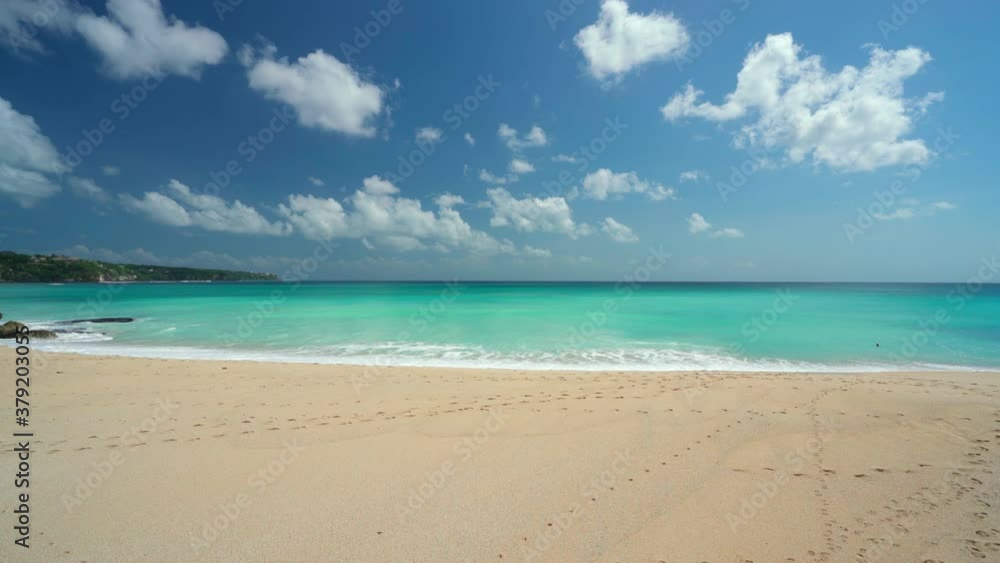 Beautiful beach with rocky mountains and clear water of Indian ocean at sunny day. Beautiful beach with rocky mountains and clear water of Indian ocean at sunny day.