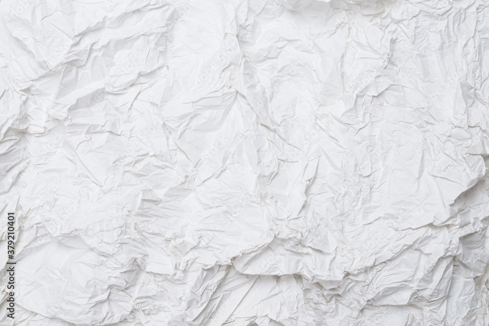 Crumpled white paper background. Crumpled white paper background.