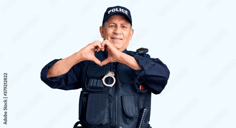 Senior handsome man wearing police uniform smiling in love showing heart symbol and shape with hands. romantic concept. Senior handsome man wearing police uniform smiling in love showing heart symbol and shape with hands. romantic concept.