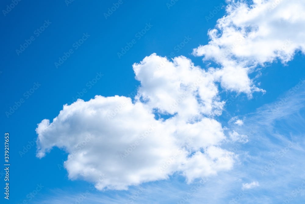 Obraz premium blue sky with clouds close up on a Sunny day