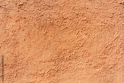 Abstract rough beige texture. Architectural abstract background. Plastered building wall.