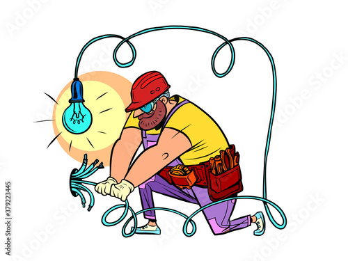 The electrician lays the wires