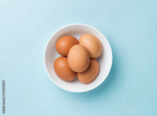 chicken eggs in a white bowl