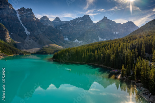 Kayaking  canoeing on the iconic Moraine Lake  which is one of the most popular travel destination and outdoor activity in Banff National Park of Canada