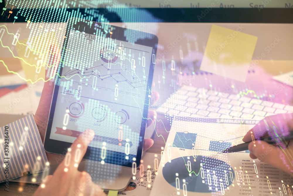 Multi exposure of man's hands holding and using a phone and financial chart drawing. Market analysis concept.