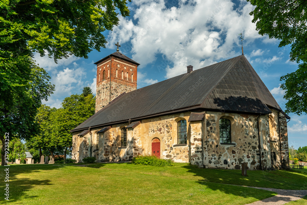 Summer view of the old Saint Nicholas church in Arboga Sweden, built in the 11th century Summer view of the old Saint Nicholas church in Arboga Sweden, built in the 11th century