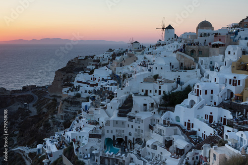 Watching the sunset after glow from the cliffs of Oia in Santorini.