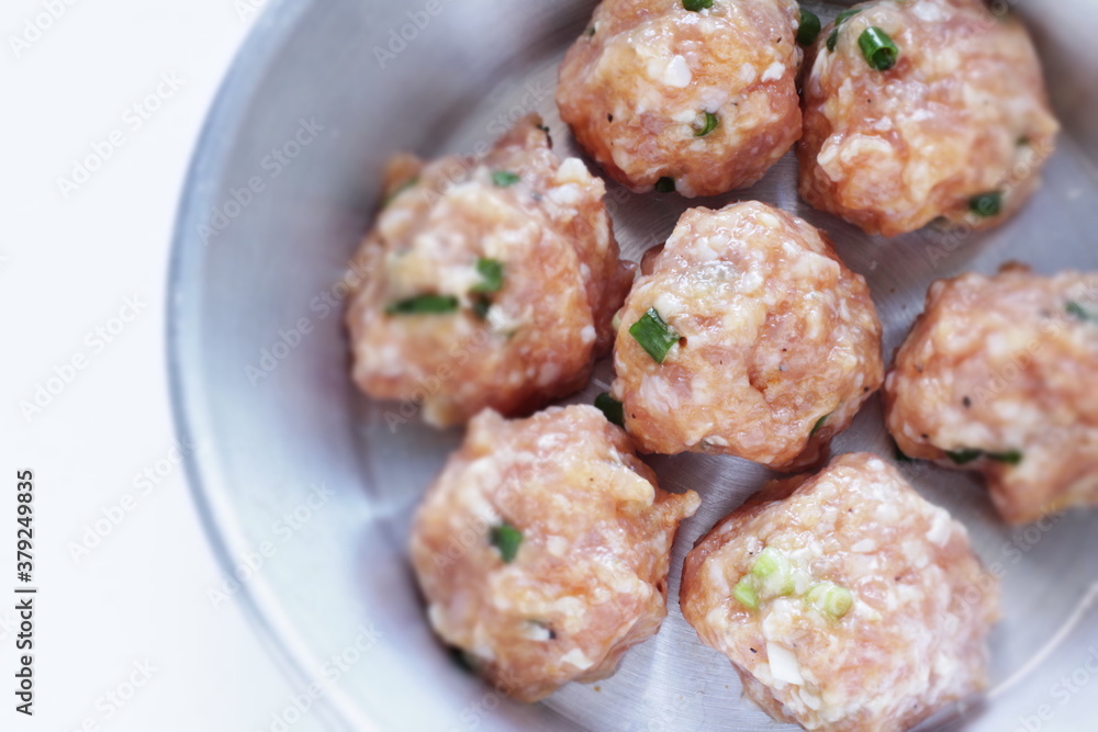 Homemade scallion and green onion meat ball on pan for Chinese cooking Homemade scallion and green onion meat ball on pan for Chinese cooking