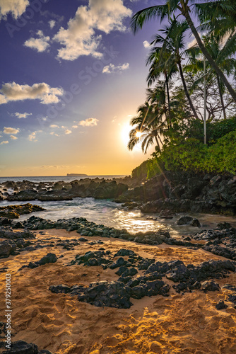 Sunset over Secret Beach Maui. © Andy