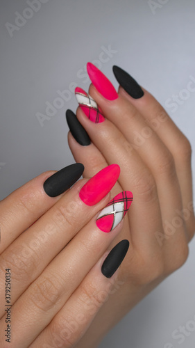 Stylish  female manicure. Nail designs with decoration.