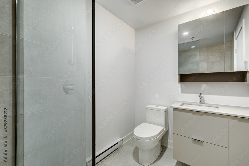Real estate photography - Beautiful empty brand new apartment in an apartment building with bathroom, new kitchen, new floors, all white painted Real estate photography - Beautiful empty brand new apartment in an apartment building with bathroom, new kitchen, new floors, all white painted