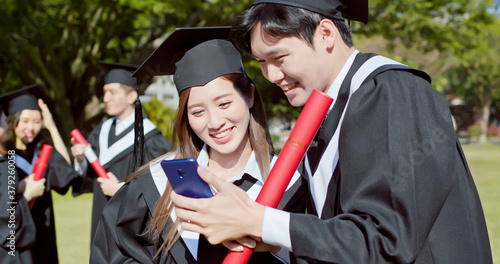 happy graduate friends take selfie