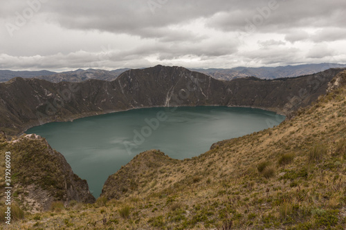 crater of a mountain with a lake, detail of mountains aligned in the landscape. Ecuador, Quilotoa
