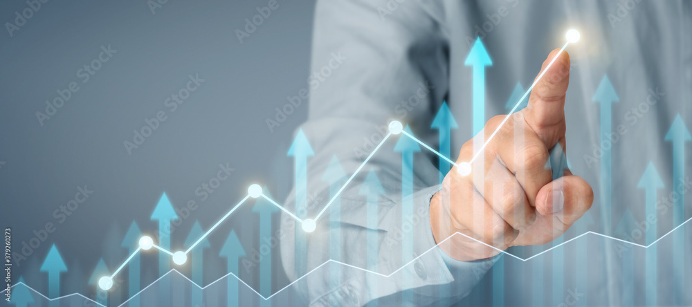 Businessman plan graph growth and increase of chart positive indicators in his business Businessman plan graph growth and increase of chart positive indicators in his business