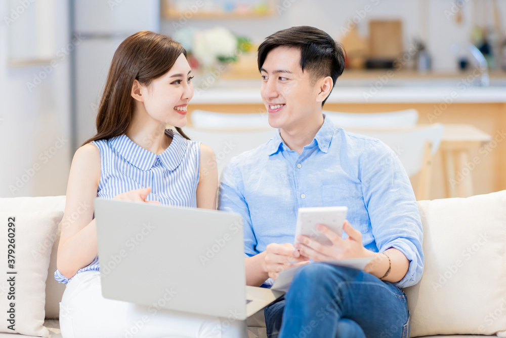 couple discuss finances at home couple discuss finances at home