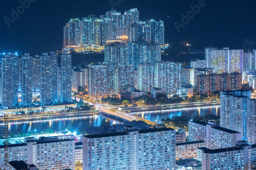 Aerial view of residential district of Hong Kong city at night © leeyiutung