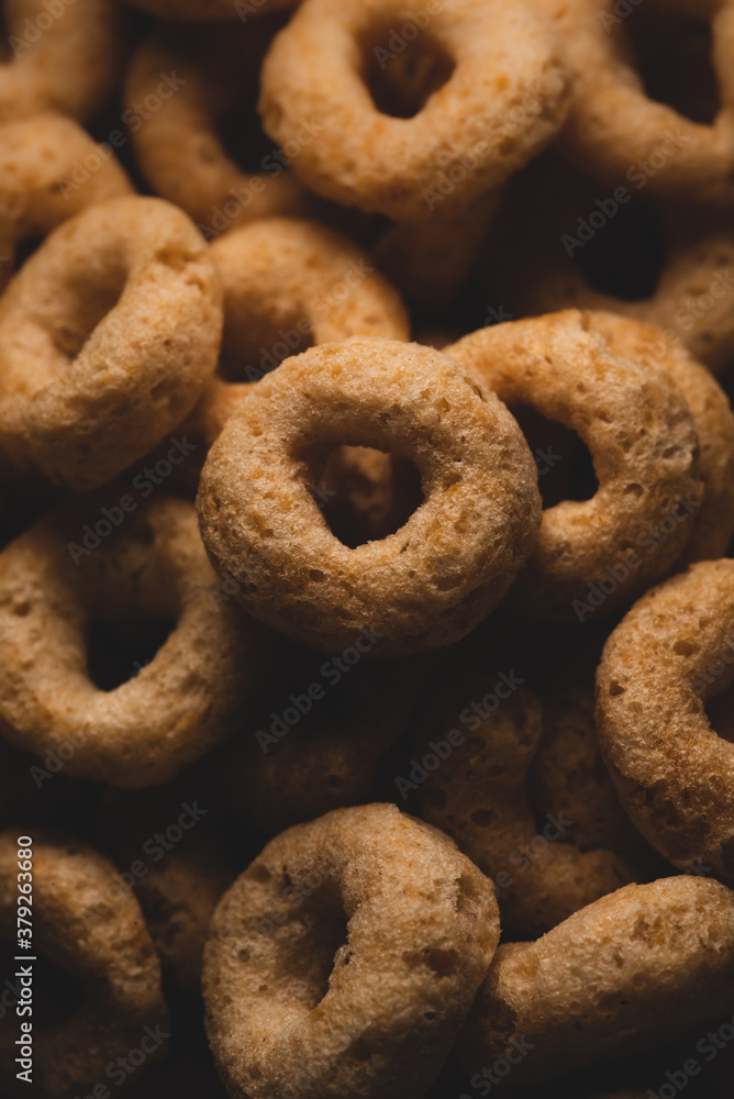 Macro photo of Healty whole grain ring cereal, macro close up. selective focus Macro photo of Healty whole grain ring cereal, macro close up. selective focus