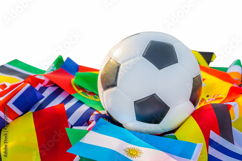 Leather soccer ball with international team flags of the participating countries in the championship tournament isolated on white background. Football equipment competitive game. World cup concept