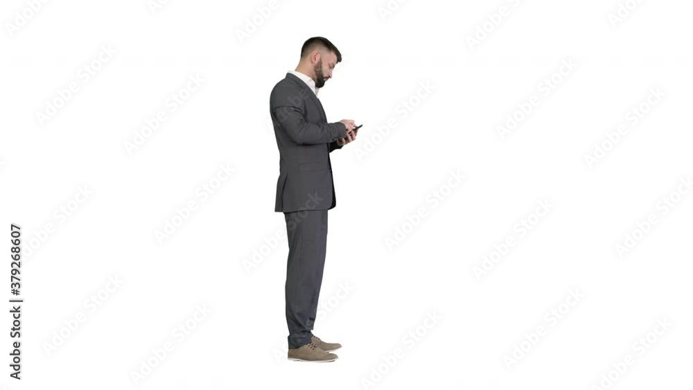 Turk business man using his phone on white background. Turk business man using his phone on white background.
