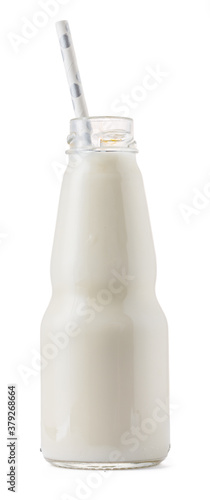 Glass cup of milk with a straw isolated on white