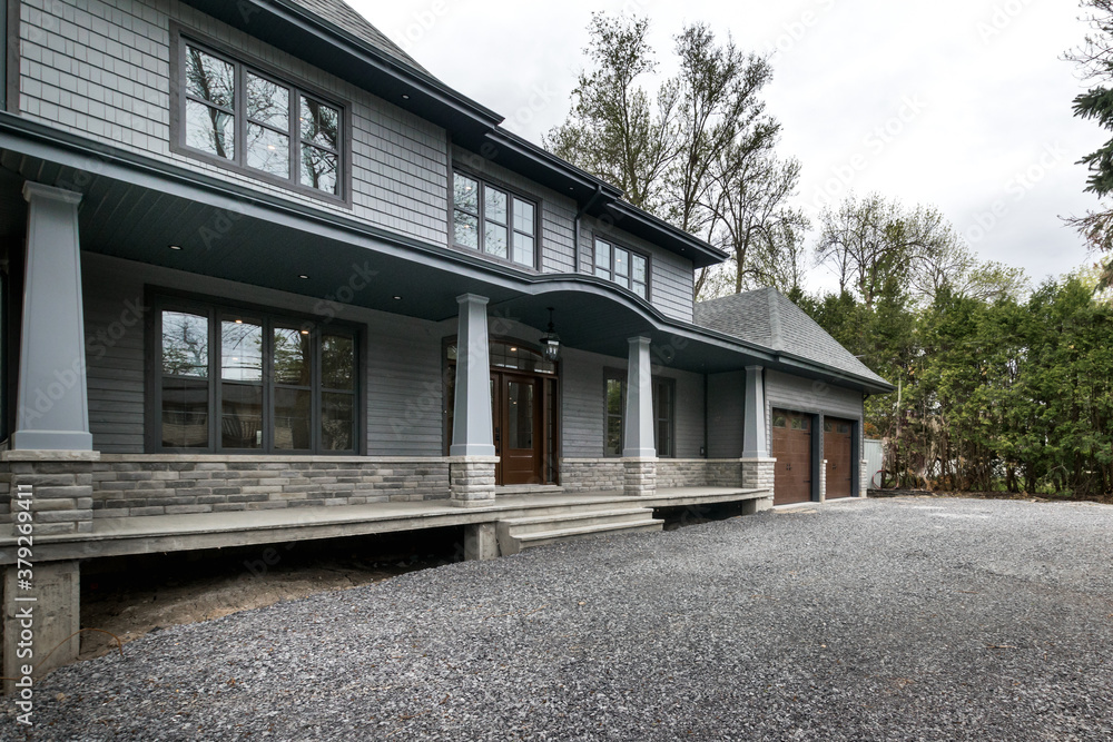 Real estate photography - New big luxury modern house in Montreal's suburb partially furnished with backyard, empty rooms, closets, basement and garage