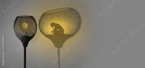 Gaslight with silhouette of woman in shadow cast by the lamp, Gaslighting concept illustration photo