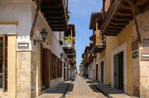 Typical colonial street with blue sky in Cartagena, Colombia
