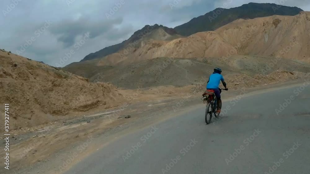 Cruising on a bicycle at Leh Ladakh Himalayas ghats pov Cruising on a bicycle at Leh Ladakh Himalayas ghats pov