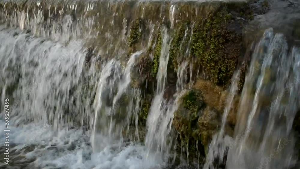 Catching a waterfall in a small freshwater channel. Catching a waterfall in a small freshwater channel.