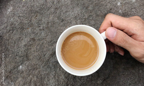 coffee milk in the hands of young men © herukru